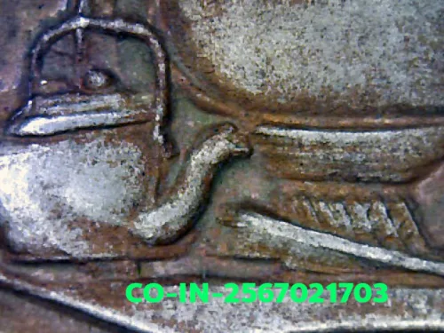 100× magnification — Luang Pu Fan Ajaro amulet, batch 9, Silver, Wat Udom