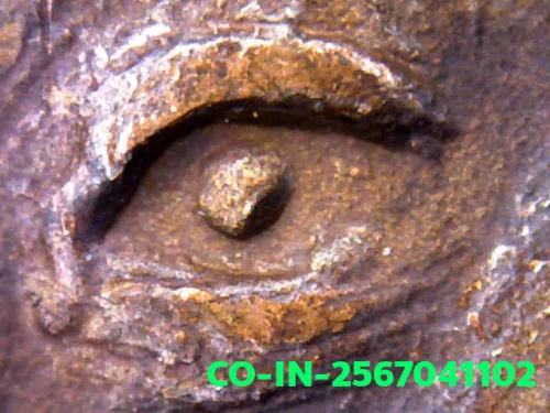 1000× magnification — Luang Pu Waen coin, Chana Suek (victory), Copper, Wat Doi