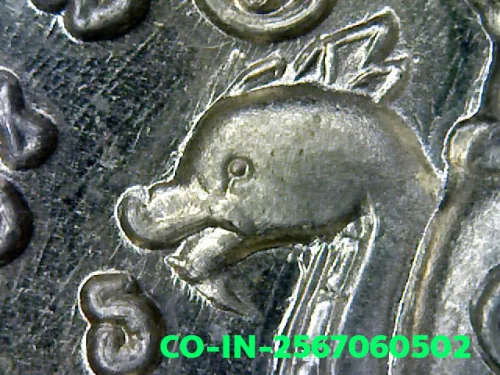 100× magnification — Jatukam Ramathep coin, first batch (Run Raek), Silver, City