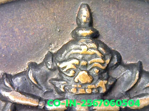 ภาพขยายรายละเอียด เหรียญปิดตาพังพระกาฬ รุ่นแรก ปี พ.ศ.2530 เนื้อทองแดง จังหวัดนครศรีธรรมราช สุดยอดแห่งเหรียญสายจตุคาม
