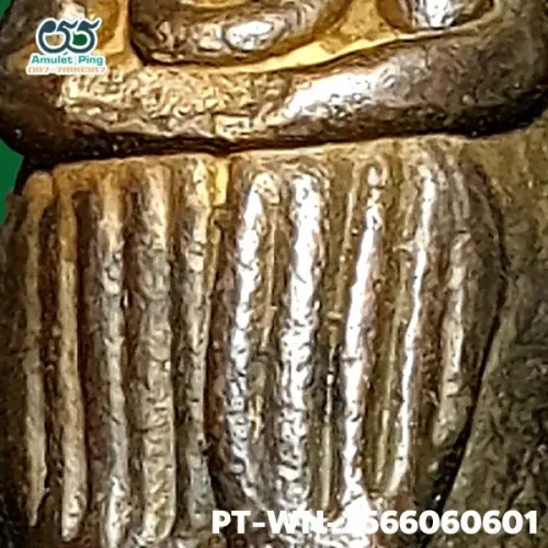 100× magnification — Luang Pu Iam statuette, Yant Yung, Na on the knee, Mixed