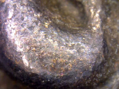 1000× magnification — Luang Pu Iam statuette, Yant Yung, Na on the knee, Mixed
