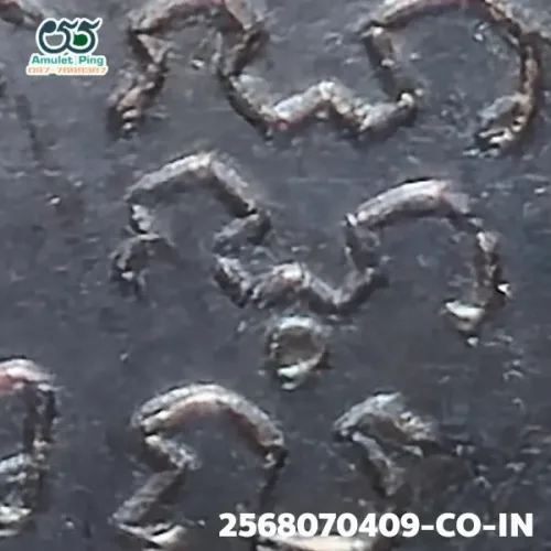 100× magnification — Luang Phor Sothon coin, first batch (Run Raek), Blackened