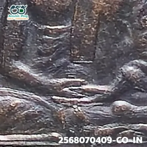 100× magnification — Luang Phor Sothon coin, first batch (Run Raek), Blackened