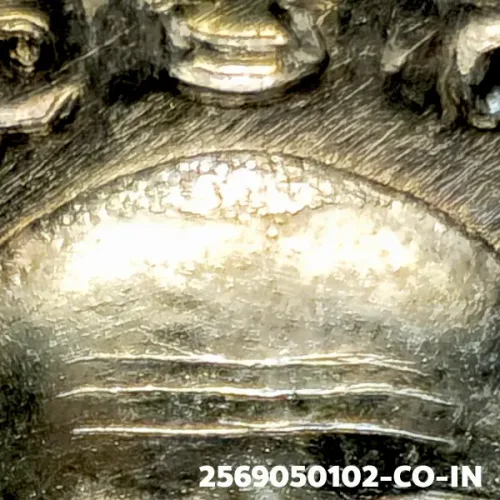 100× magnification — Luang Phor Thuad coin, Pha Pak (split mouth), Silver, Wat