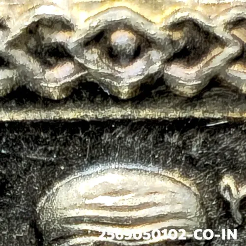 100× magnification — Luang Phor Thuad coin, Pha Pak (split mouth), Silver, Wat