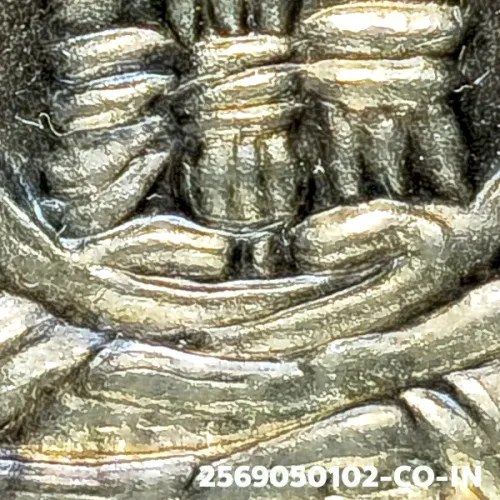 100× magnification — Luang Phor Thuad coin, Pha Pak (split mouth), Silver, Wat