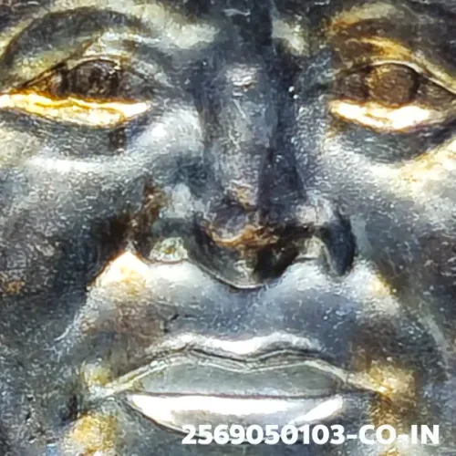 100× magnification — Luang Phor Thuad coin, Pha Pak (split mouth), Silver, Wat