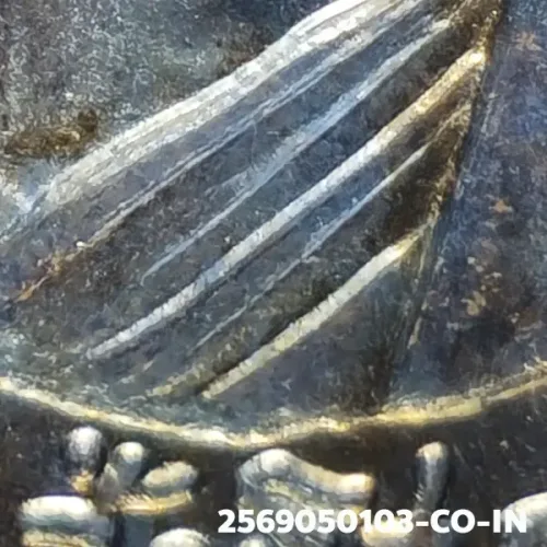 100× magnification — Luang Phor Thuad coin, Pha Pak (split mouth), Silver, Wat