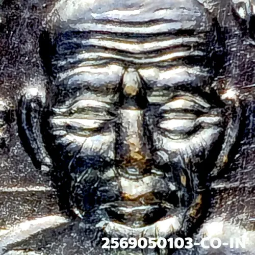 100× magnification — Luang Phor Thuad coin, Pha Pak (split mouth), Silver, Wat