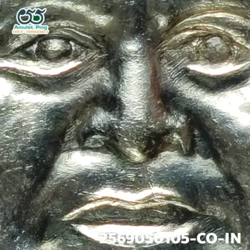 100× magnification — Luang Phor Thuad coin, Pha Pak (split mouth), Silver, Wat