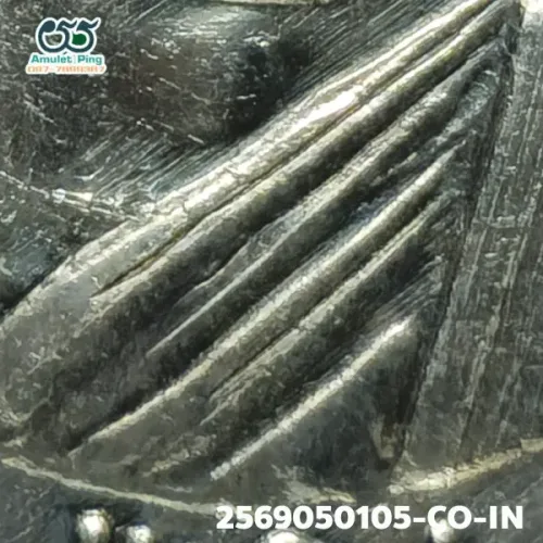100× magnification — Luang Phor Thuad coin, Pha Pak (split mouth), Silver, Wat