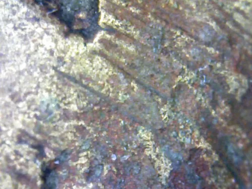 1000 倍放大 — 龙婆银铜牌 大锄形 合金 瓦邦干寺 披集府 佛历 2462