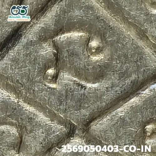 100× magnification — Luang Pu Tim amulet, Phim Sema, 8th cycle (age 96), Silver