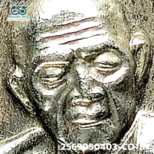 100× magnification — Luang Pu Tim amulet, Phim Sema, 8th cycle (age 96), Silver