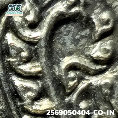 100× magnification — Luang Pu Tim amulet, Phim Sema, 8th cycle (age 96), Silver