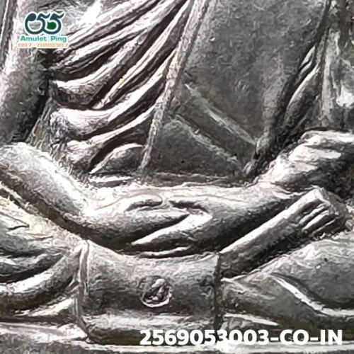 100× magnification — Luang Pu Tim amulet, Phim Charoen Phon Lang (text below)