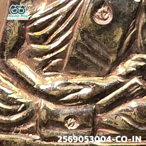 100× magnification — Luang Pu Tim amulet, Phim Charoen Phon Lang (text below)