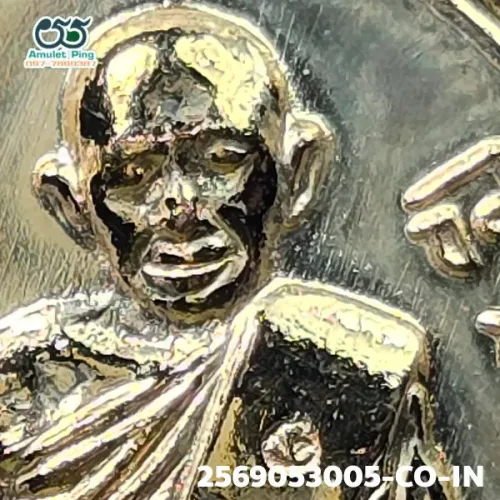 100× magnification — Luang Pu Tim amulet, Phim Charoen Phon Lang (text below)