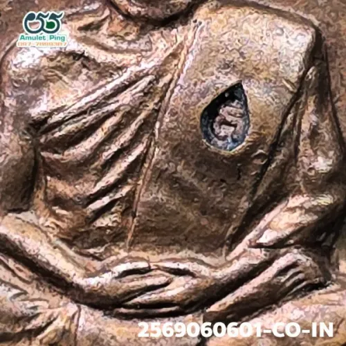 100× magnification — Luang Pu Tim amulet, Charoen Phon 2, Copper, Wat Lahan Rai