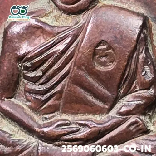 100× magnification — Luang Pu Tim amulet, Charoen Phon 2, Copper, Wat Lahan Rai