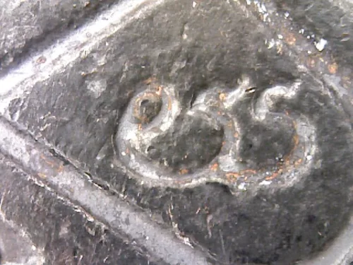 100× magnification — Luang Pu Tim amulet, Sema, 8th cycle (age 96), Nawa