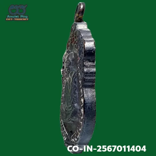 Luang Pu Tim amulet, Sema, 8th cycle (age 96), Nawa (nine-metal alloy), Wat Lahan Rai, Rayong, BE — left edge