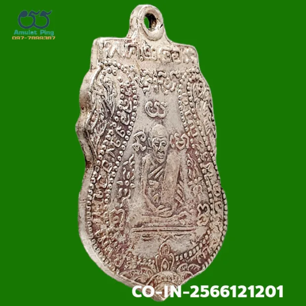 Luang Phor Klan coin, first batch (Run Raek), Silver, Wat Phra Yat, Ayutthaya, BE 2469 — front, angled right