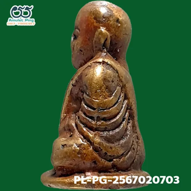 Luang Phor Ngern statuette, Niyom 4-Chai, Indra-eye, Mixed alloy, Wat Bang Khlan, Phichit, BE 2462 — back, angled right